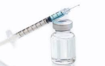 A syringe and accompanying vial